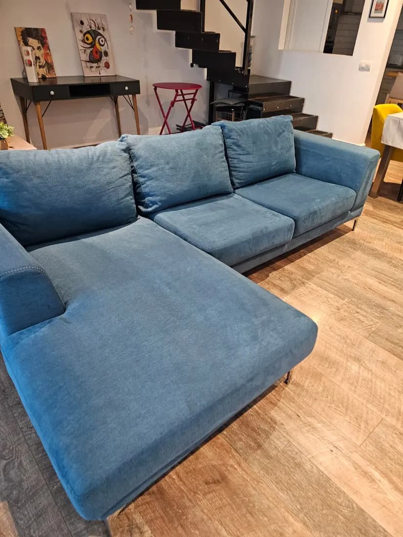 blue fabric chaise sofa after professional cleaning by ARA Clean Malta