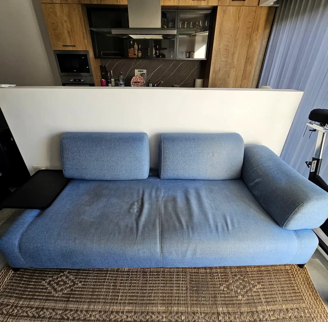 blue two-seater fabric sofa before cleaning by ARA Clean Malta