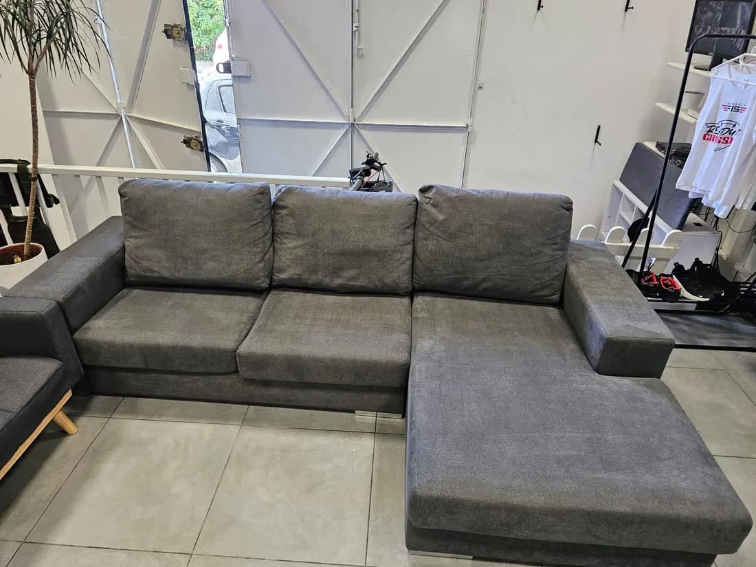 grey fabric chaise sofa after professional cleaning by ARA Clean Malta
